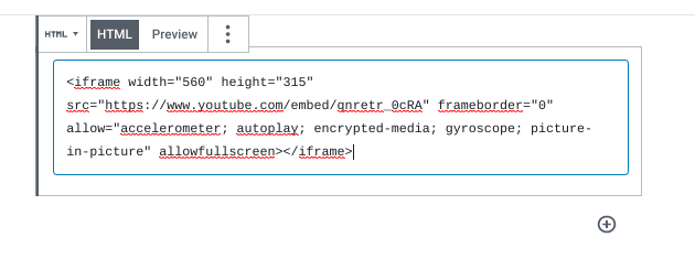 The iframe embed code for a YouTube video pasted in a Custom HTML block.